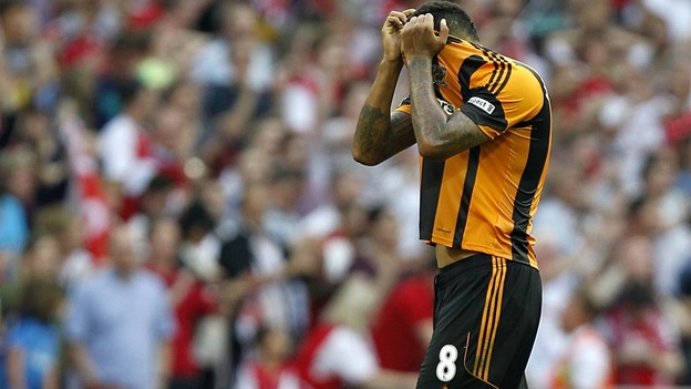 Hull City's Tom Huddlestone reacts to his team's FA Cup loss