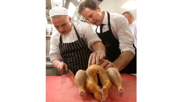 The Deputy Prime Minister looks inside a chicken.