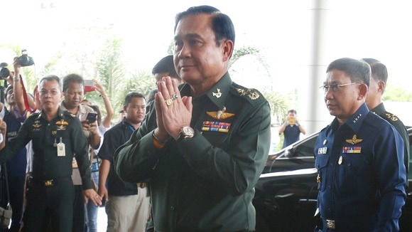 Thai Army chief General Prayuth Chan-ocha arrives to give a news conference at the Army Club in Bangkok today.