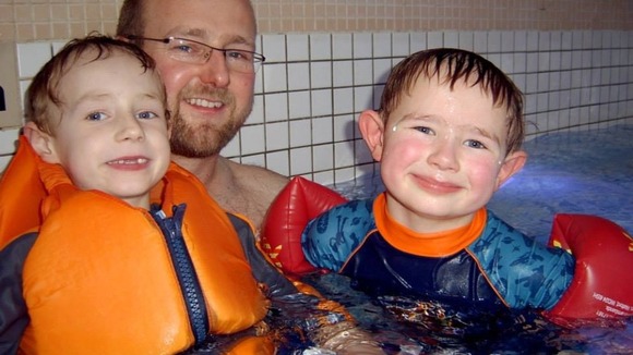Harry with his dad and brother