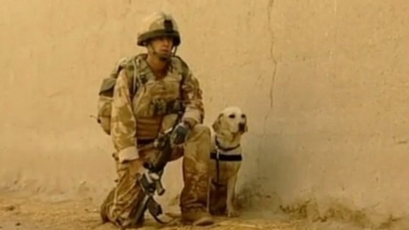 Lance Corporal Kenneth Rowe and army labrador Sasha.