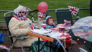 An elderly lady and little girl celebrate the Diamond Jubilee