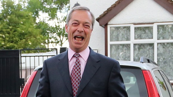 Nigel Farage photographed outside his home this morning.
