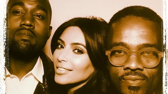 Bridge and groom Kanye West and Kim Kardashian pose with singer Tony Williams.