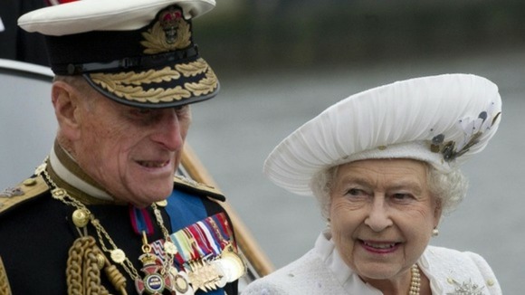 Queen Elizabeth II and the Duke of Edinburgh arrive at Chelsea Pier during the Diamond Jubilee River Pageant yesterday.