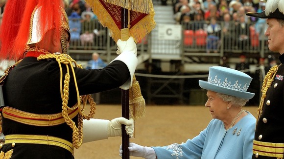 Queen Elizabeth II at Horse Guards Parade, London, as she presents the Household Cavalry with new standards.