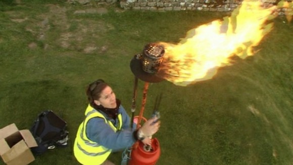 A beacon being lit at Hadrian's Wall