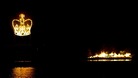 A crown shaped firework is lit behind the Holme Pierrepont Beacon which is floating on the Regatta in Nottingham