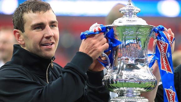 James McArthur with the FA Cup after Wigan's win last year.