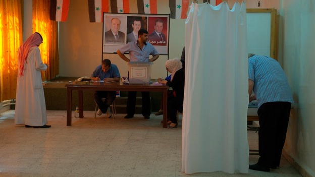 People voting at a polling station in Damascus June 3, 2014.
