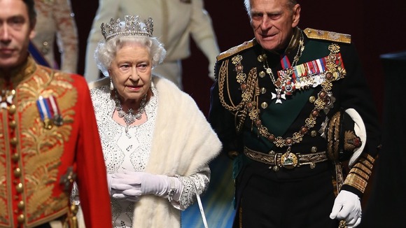 Queen Elizabeth II and the Duke of Edinburgh after the state opening of Parliament last year.