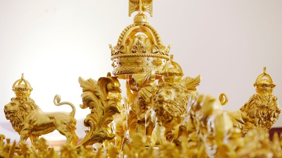 The wooden crown was carved from oak from Lord Nelson's flagship HMS Victory.