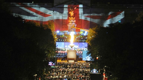 The moment when The Queen lit her Beacon at Buckingham Palace