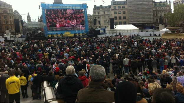 Crowds watch the ITV big screen in Trafalgar Square.