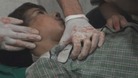 An 11-year-old fights for his life after being hit by a mortar less than ten miles from Damascus, rebels told ITV News.
