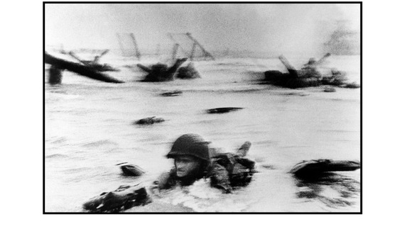 This image of a GI struggling to shore fronted Capa's memoir, Slightly Out Of Focus