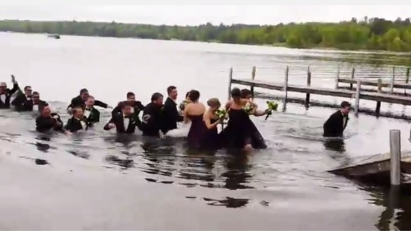 The party of 22 was too much weight for the decking and it collapsed leaving the party chest-deep in the lake.