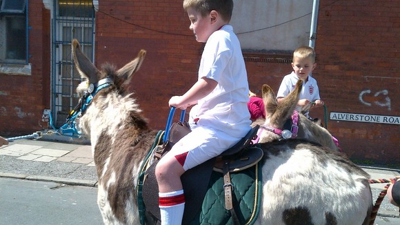 Donkey rides at a street party on the Wirral 