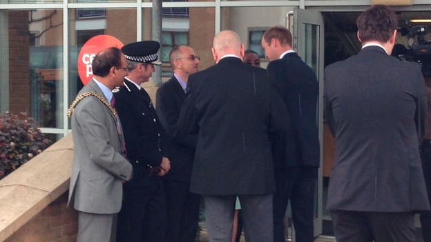 Prince William chats to officials at Centrepoint
