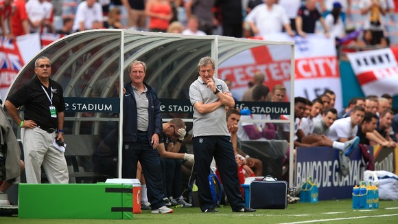 Roy Hodgson and members of the England squad watch on in Miami.
