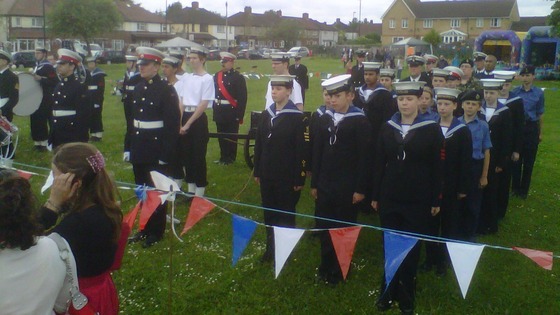 The cadets stand for the National Anthem.