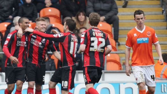 Lewis Grabban celebrates scoring against Blackpool last season.