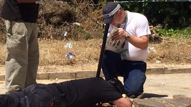 Police send cameras into a drain in the search for Madeleine Mccann.