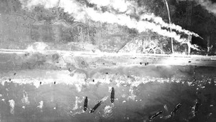 Smoke billows as the allied troops land at Gold Beach on D-Day.