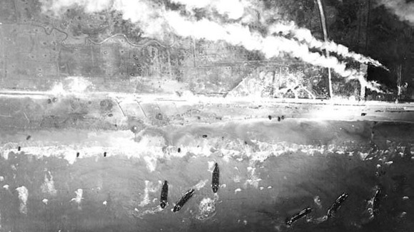 Smoke billows as the allied troops land at Gold Beach on D-Day.