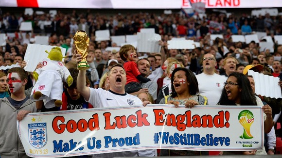 Optimistic supporters cheer before the friendly with Peru at Wembley on May 30.