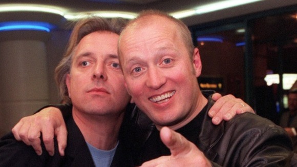 Rik Mayall, who has died aged 56, with comedy partner Ade Edmondson.