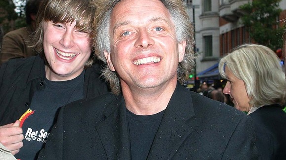 Comic Rik Mayall, who died aged 56, at a film premiere in London in 2004.