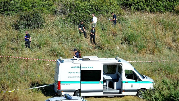 British police and their Portuguese counterparts search a second area of scrubland.