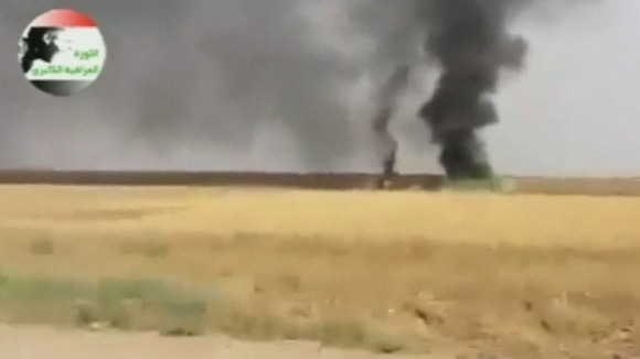 Footage is said to show smoke billowing from the old refinery town of Baiji.