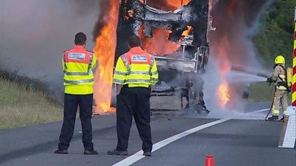 The double-decker bus was completely alight.