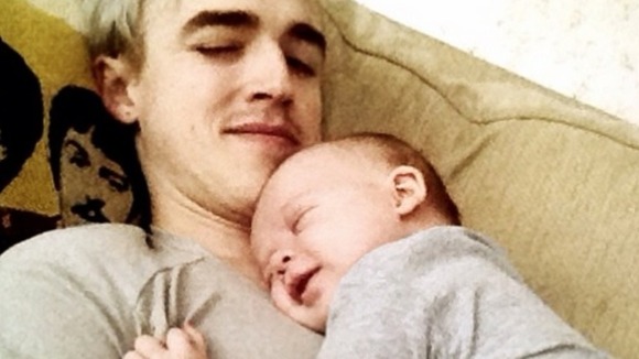 The McFly star wrote next to this picture 'I think he's happy daddy's home.'