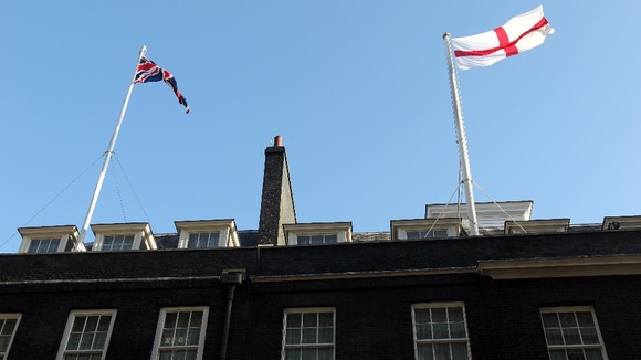 The flag fluttering atop 10 Downing Street on St George's Day.