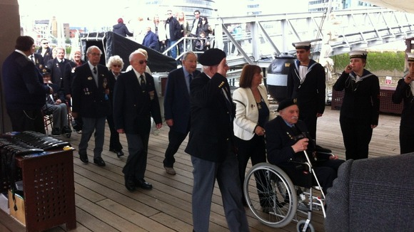 D Day Veterans arriving on ship.