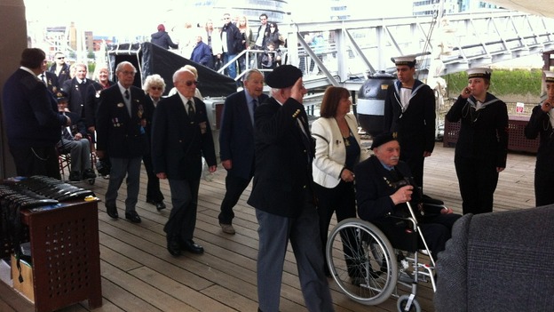 D Day Veterans arriving on ship.