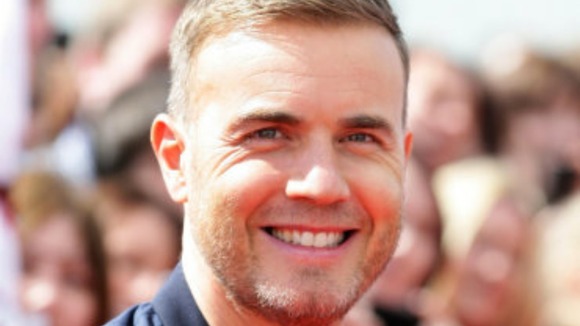 Smiling Gary Barlow arrives at Manchester X Factor auditions