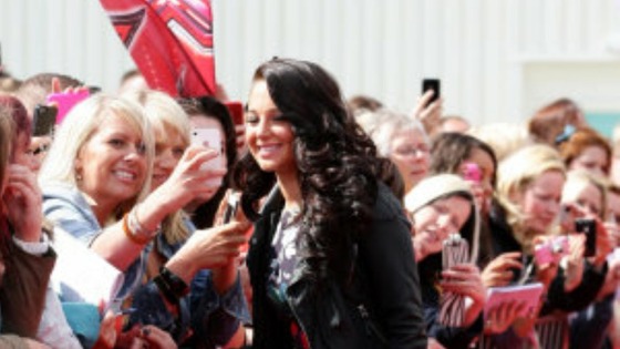 Tulisa Contostavlos wore a floral mini-dress as she took the red carpet and greeted fans who gathered outside. 