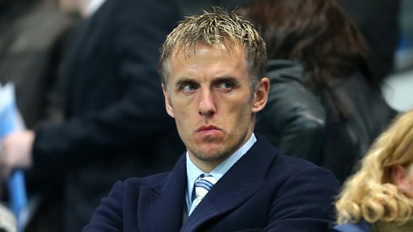 Phil Neville, a former player whose career included stints at Manchester United and Everton.