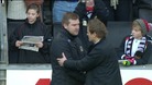 MK Dons manager Karl Robinson embraces AFC Wimbledon boss Neil Ardley after their FA Cup 2nd Round tie, December 2012