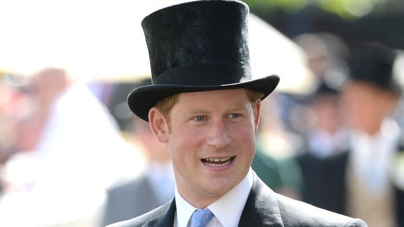 Prince Harry in his traditional Ascot top hat.