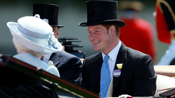 Prince Harry arrives in a carriage with the Duchess of Cornwall and Duke of York.