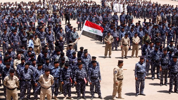 Volunteers who have joined the Iraqi security forces gather in the holy city of Najaf.