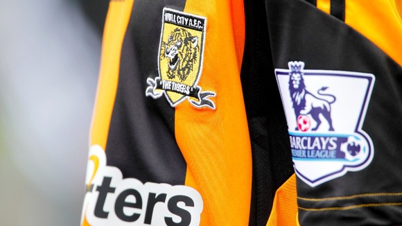 The Tigers old badge featured writing