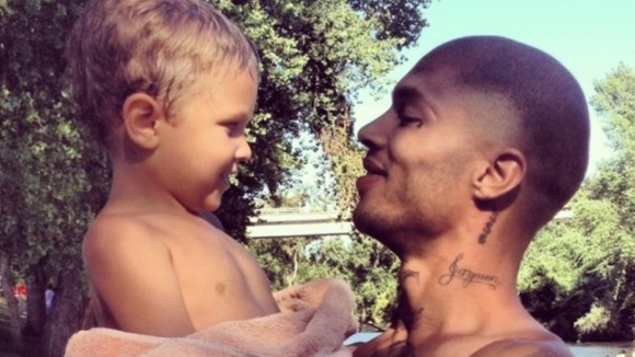 Meeks, pictured with his young son, is 'so sweet' his mother says.