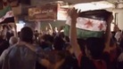 Amateur video has emerged from Syria purportedly showing protesters on the streets following the reported massacre.