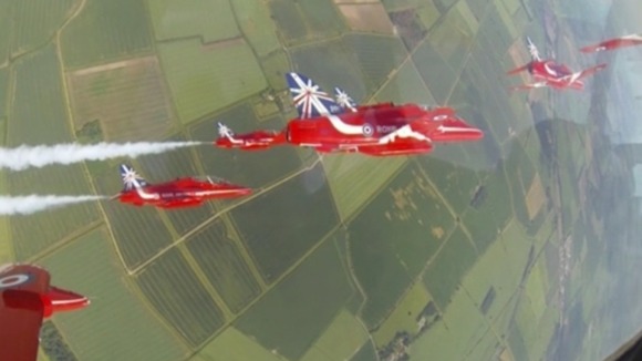 A view from inside the cockpit of a Red Arrows jet.